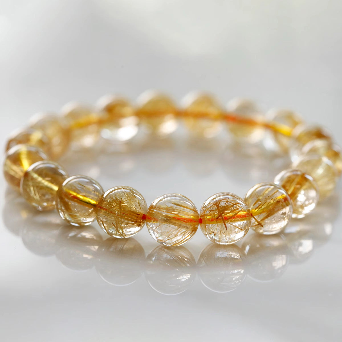 Golden Whispers: Brazilian Cat's Eye Crystal Elegance