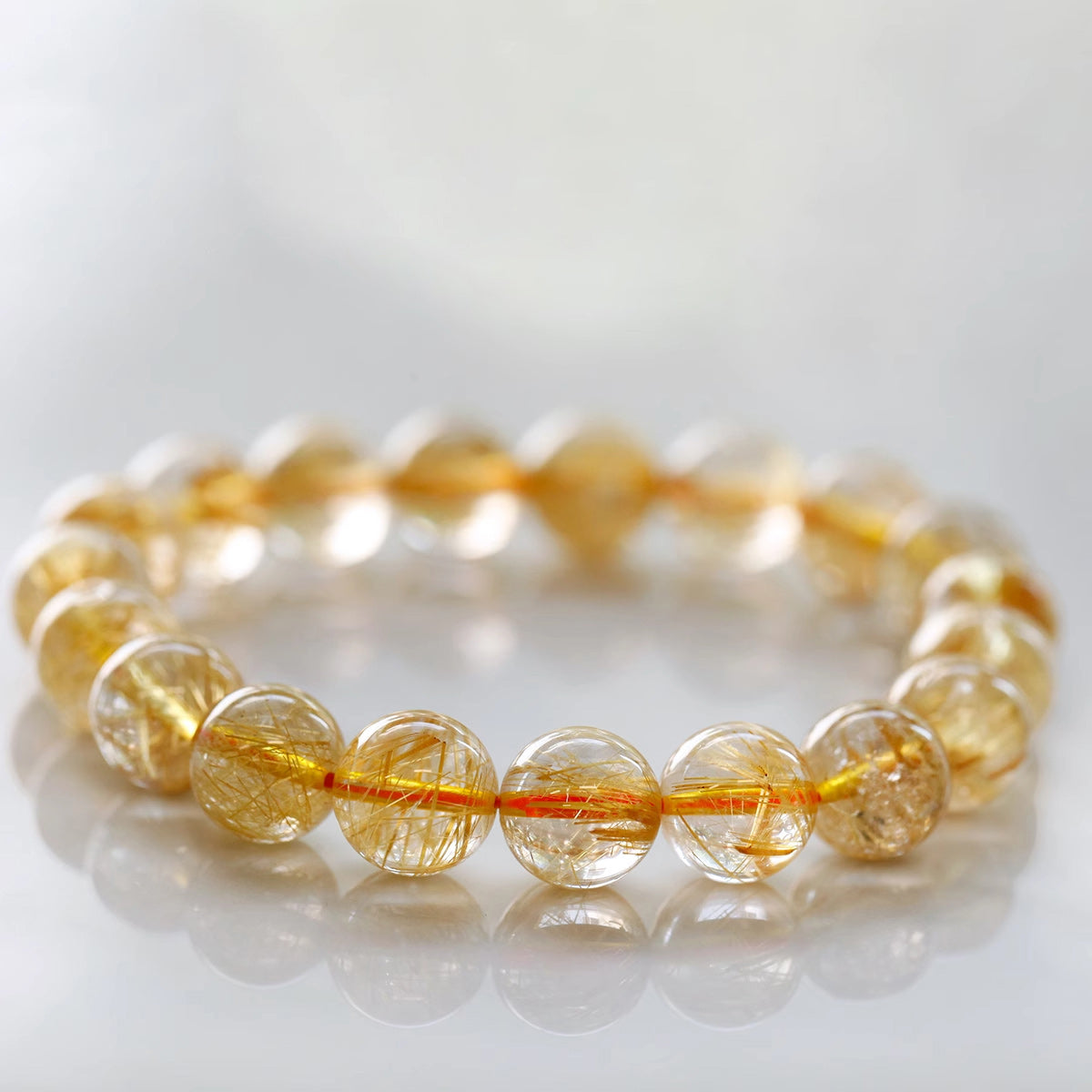 Golden Whispers: Brazilian Cat's Eye Crystal Elegance